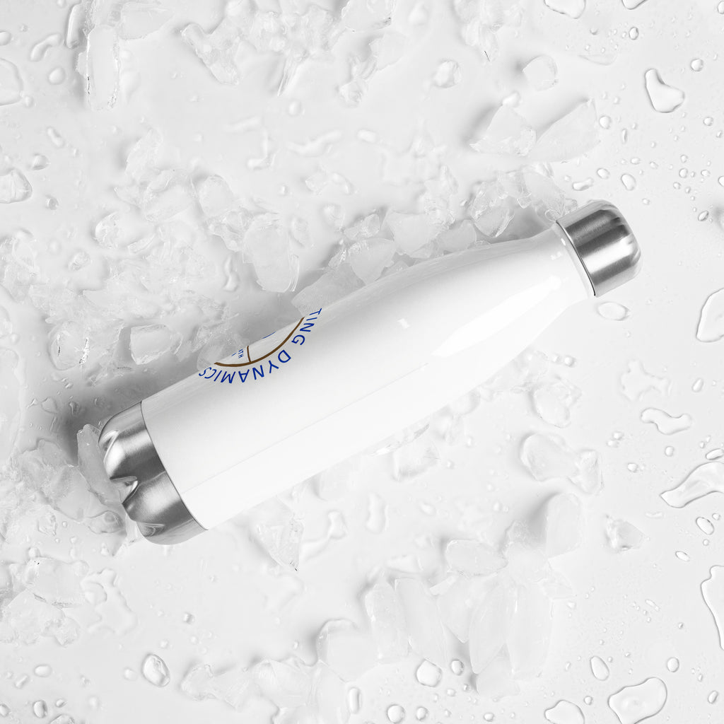 Stainless steel water bottle from SCD One laying on a flat surface with a back right tilt