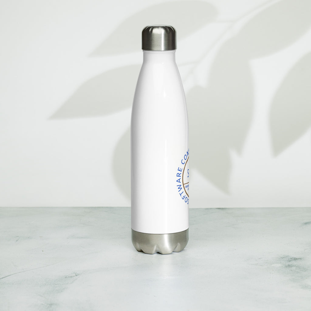 Stainless steel water bottle from SCD One resting on a flat surface sitting upright showing the  design free back side alternate view
