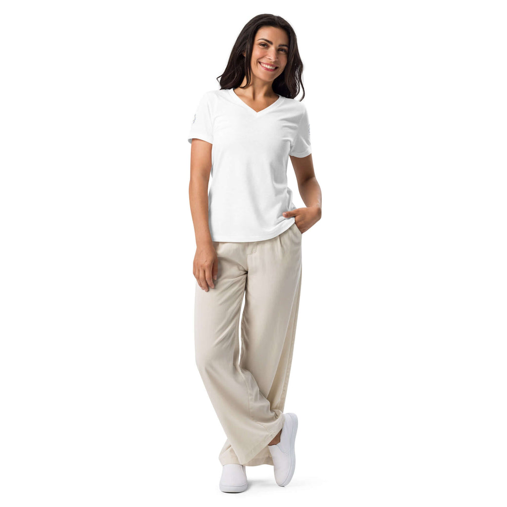 Women's relaxed v-neck t-shirt full body display with woman standing with her legs crossed